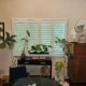 Modern window shutters providing light control, privacy, and a stylish interior finish